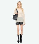 Jumper Rany - Crochet sweater with metallic wing clasp and rhinestones.