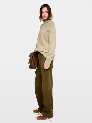Mora Side Button Sweater - High-neck sweater with buttoned collar opening.