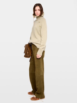 Mora Side Button Sweater - High-neck sweater with buttoned collar opening.