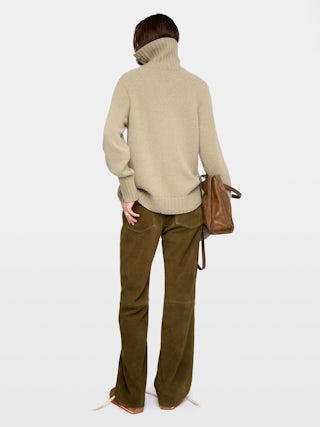 Mora Side Button Sweater - High-neck sweater with buttoned collar opening.