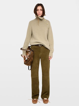 Mora Side Button Sweater - High-neck sweater with buttoned collar opening.
