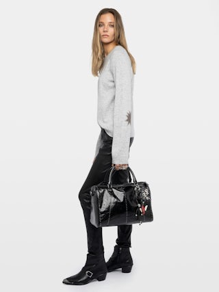 Jumper Cara - Crew-neck jumper with leather patch.