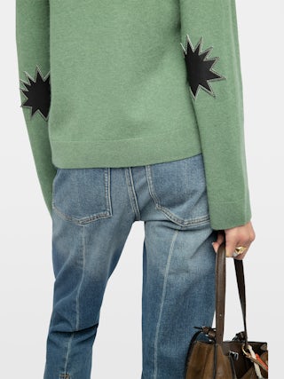 Vera Jumper - V-neck jumper with leather patch.