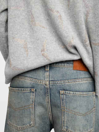 Markuz Cashmere Sweater - Round neck sweater with rhinestone wings.