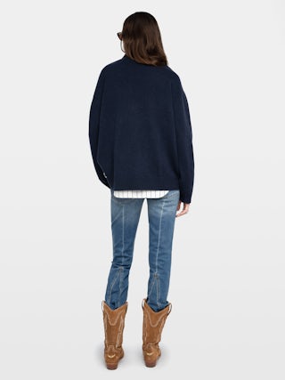 Swyny Jumper - Oversized V-neck jumper with hand embroidery at hem.