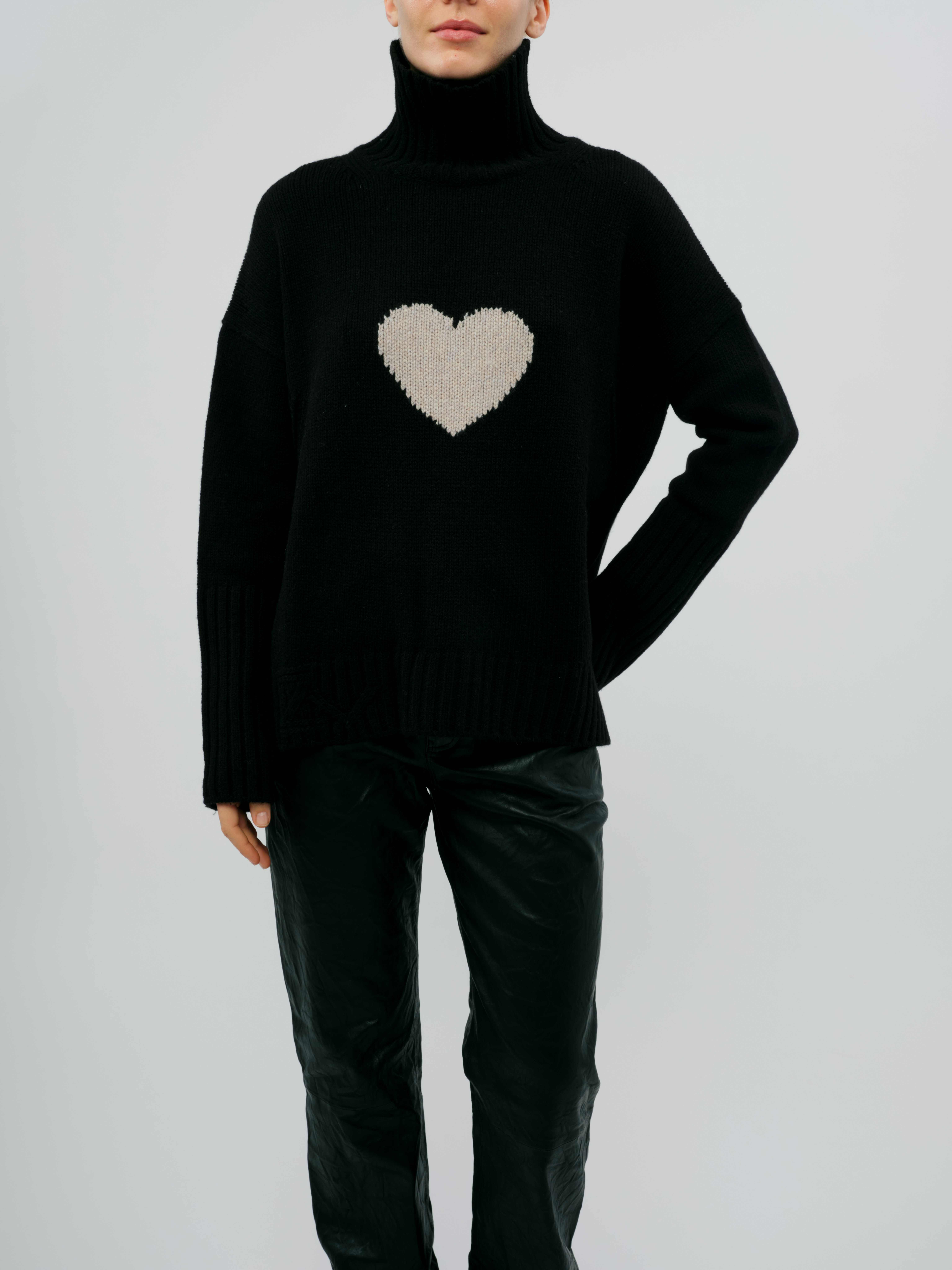 Alma Heart Sweater - Knit sweater featuring a heart design.