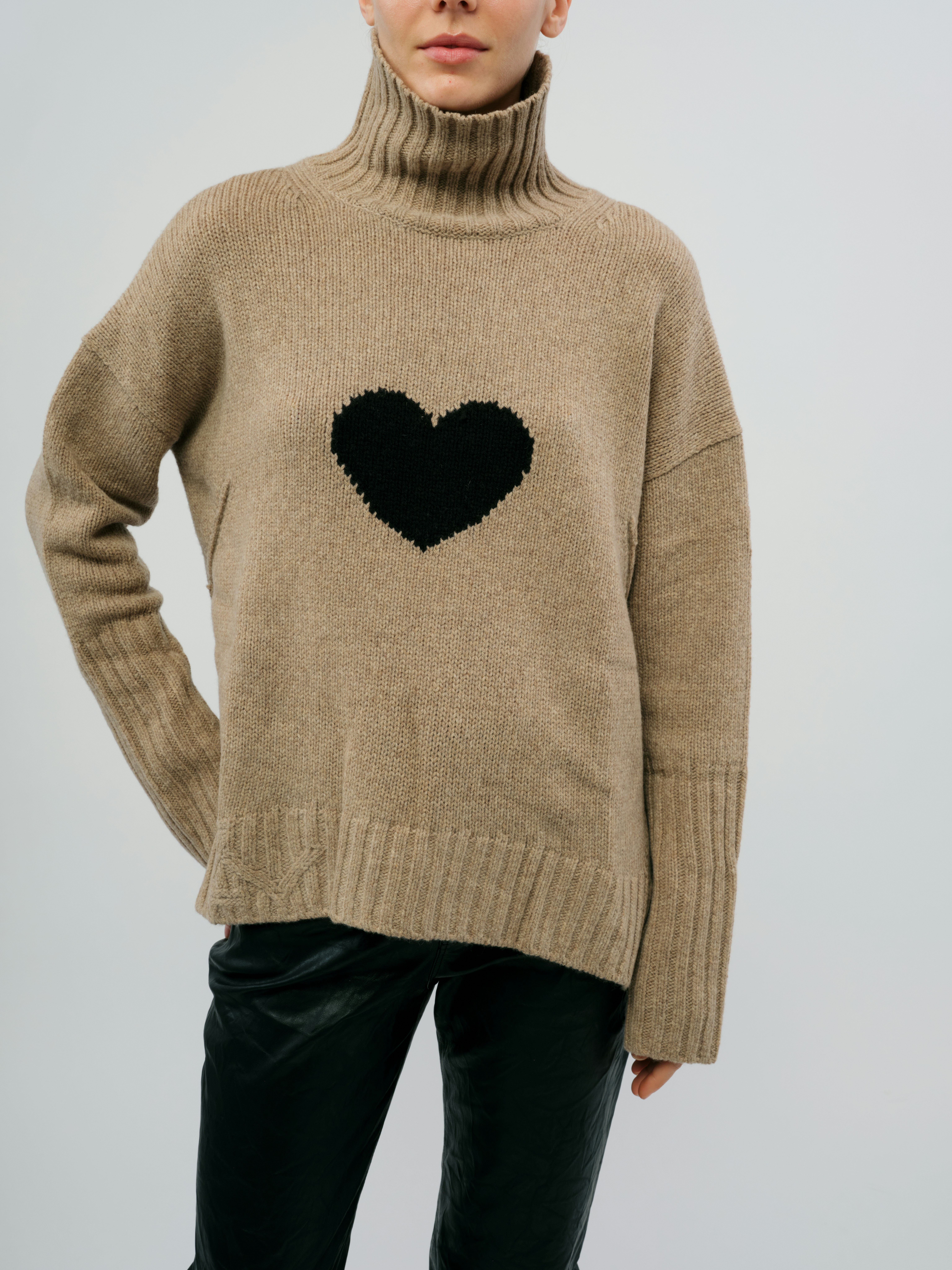 Alma Heart Sweater - Knit sweater featuring a heart design.