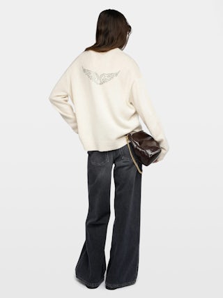 Mikyz Cashmere Sweater - V-neck sweater with rhinestone wing detail on the back.