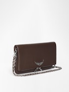 Rock Pochette - Pochette aus genarbtem Leder mit doppelten Leder- und Metallketten und mit Strass verzierten Flügeln.