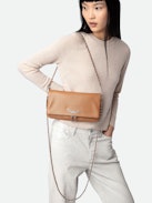 Rock Clutch - Grained leather pochette with double leather and metal chains and rhinestone-adorned wings.