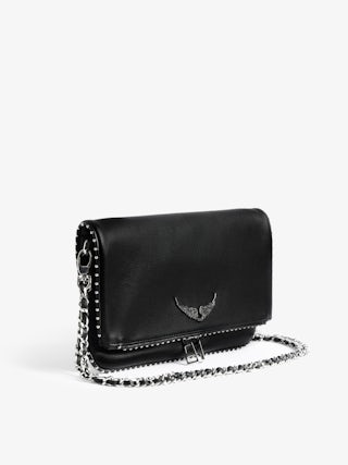 Rock Studs Pochette - Iconic rock clutch in black grained leather with studs.
