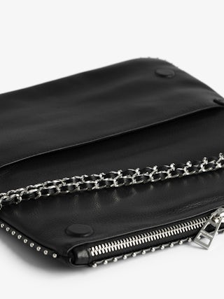 Rock Studs Pochette - Iconic rock clutch in black grained leather with studs.
