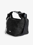 Le Cecilia Bag - Black basket-style bag with leather shoulder strap and metallic C buckle.