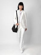 Le Cecilia Bag - Black basket-style bag with leather shoulder strap and metallic C buckle.