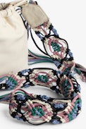 Rock To Go Bag - Women’s bucket bag in ecru leather with detachable macramé shoulder strap with multicolour fringes