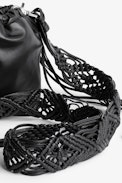 Rock To Go Bag - Women’s bucket bag in black leather with detachable macramé shoulder strap with fringing
