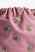 Rock To Go Bag - Women’s bucket bag in pink leather studded with green crystal hearts