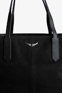 Mick Canvas Bag - Black canvas tote bag with silver wings charm on front.