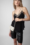 Rock Nano Dotted Swiss Clutch - Women's small white grained leather clutch with dotted Swiss studs, chains and wings.