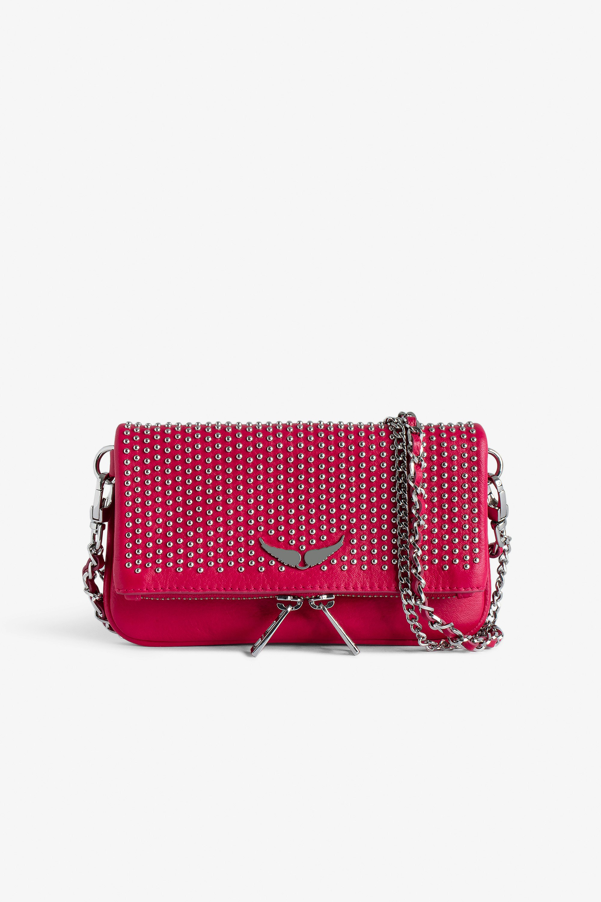 Rock Nano Dotted Swiss Clutch - Women’s small pink grained leather clutch with dotted Swiss studs, chains and wings.