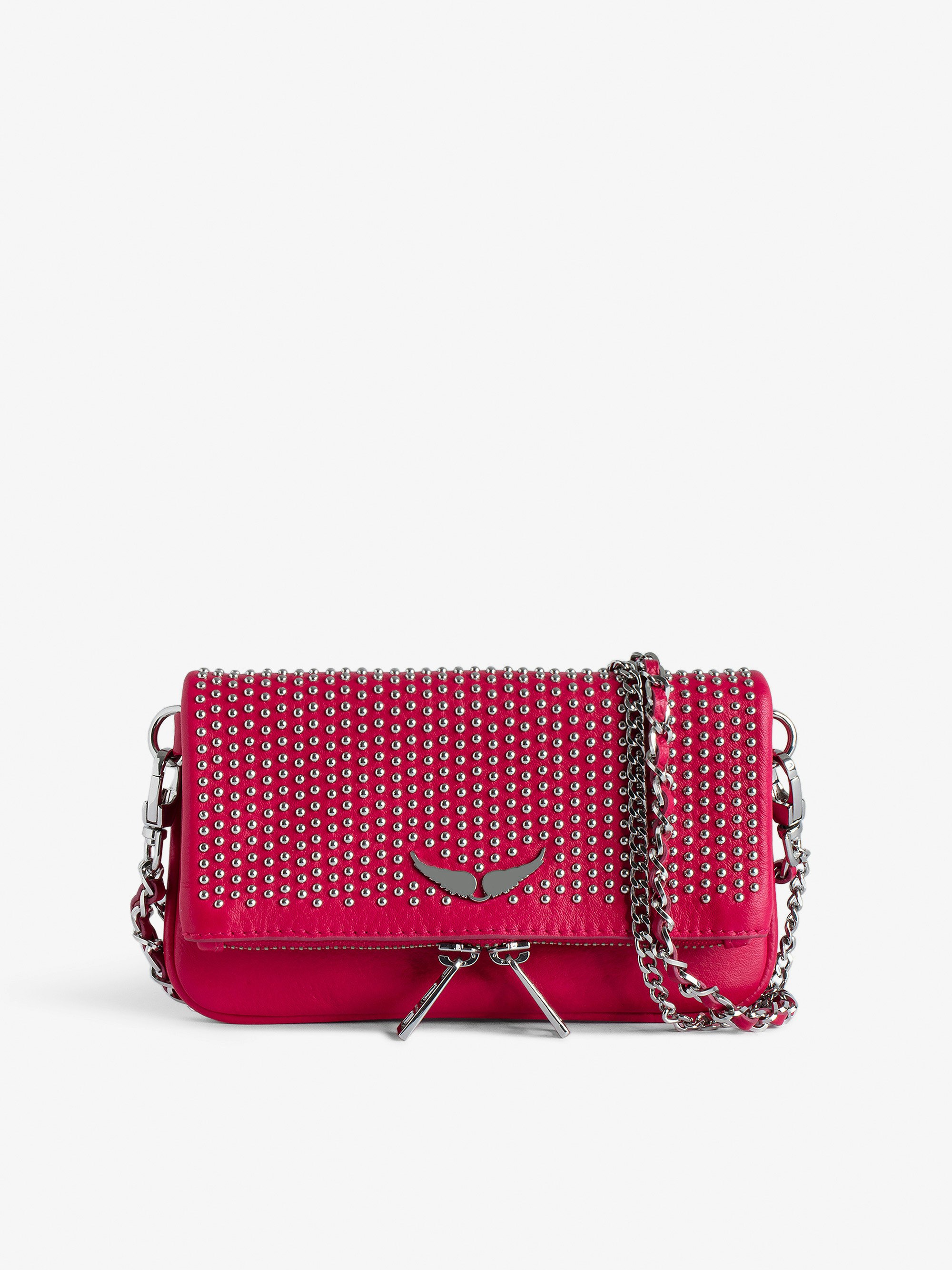 Rock Nano Dotted Swiss Clutch - Women’s small pink grained leather clutch with dotted Swiss studs, chains and wings.