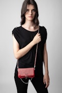 Rock Nano Dotted Swiss Clutch - Women’s small red grained leather clutch with dotted Swiss studs, chains and wings.