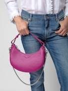 Moonrock Bag - Fuchsia grained leather half-moon bag with handle and chain shoulder strap.