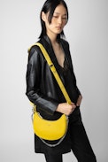 Moonrock Bag - Women’s half-moon bag in yellow grained leather with a short handle, shoulder strap, chain and signature wings.