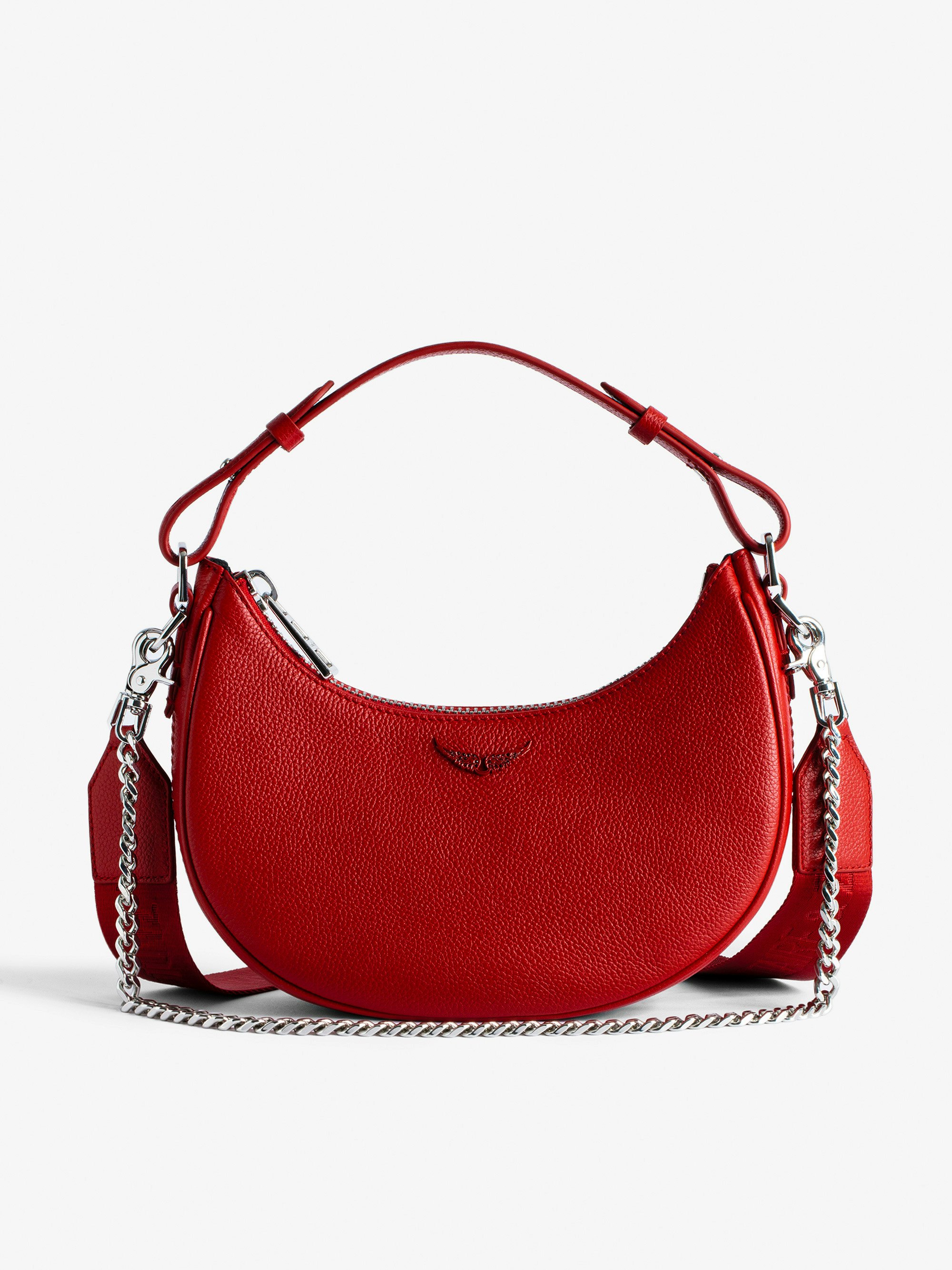 Tasche Moonrock - Halbmondtasche für Damen aus rotem genarbtem Leder mit kurzem Henkel, Schulterriemen, Kette und Signature-Flügeln.