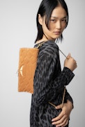 Rock Quilted Suede Clutch - Women’s camel snakeskin-effect quilted suede clutch with wings charm.