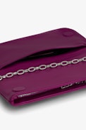 Rock Eternal Clutch - Women’s fuchsia smooth leather clutch with tied shoulder strap, chain and wings.