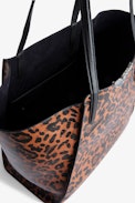 Le Borderline Leopard Bag - Women’s reversible tote bag in brown leopard-print patent leather with handle and metal wings.