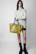 Le Borderline Leopard Bag - Women’s reversible tote bag in yellow leopard-print patent leather with handle and metal wings.