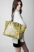 Le Borderline Leopard Bag - Women’s reversible tote bag in yellow leopard-print patent leather with handle and metal wings.