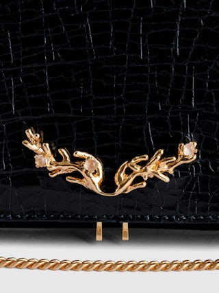 Rock Goossens Embossed Clutch - Zadig&Voltaire called upon the expertise of the art house GOOSSENS to highlight its emblematic wings on its iconic bag: the ROCK clutch.