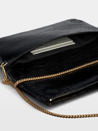 Rock Goossens Embossed Clutch - Zadig&Voltaire called upon the expertise of the art house GOOSSENS to highlight its emblematic wings on its iconic bag: the ROCK clutch.