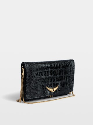 Rock Goossens Embossed Clutch - Zadig&Voltaire has called upon the expertise of the art house GOOSSENS to highlight its emblematic wings on its iconic bag: the ROCK clutch.