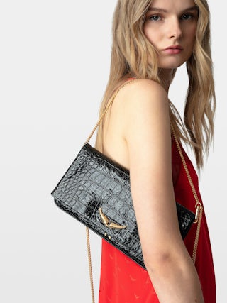Rock Goossens Embossed Clutch - Zadig&Voltaire has called upon the expertise of the art house GOOSSENS to highlight its emblematic wings on its iconic bag: the ROCK clutch.