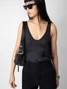 Le Cecilia XS Bag - Small black basket-style bag with leather shoulder strap and metallic C buckle.