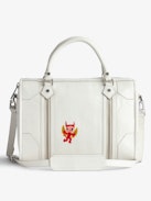 Borsa Sunny Medium #2 - Borsa in pelle verniciata ecru con manico, tracolla, charm a forma di ali e personalizzazioni create da Humberto Cruz.