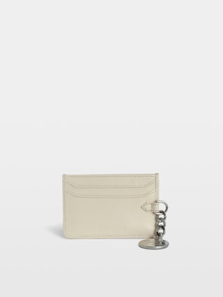 Sunny Pass Vintage Patent Card Holder - Vintage patent leather card holder with medallion charm and wing signatures.