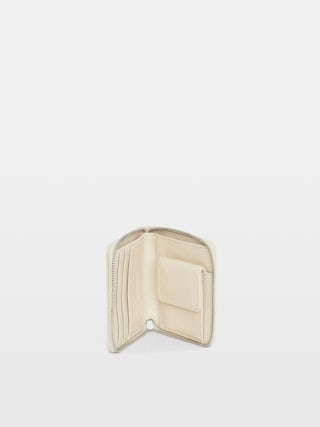 Sunny Mini Vintage Patent Wallet - Vintage-effect patent leather card holder with medallion charm and wing signatures.