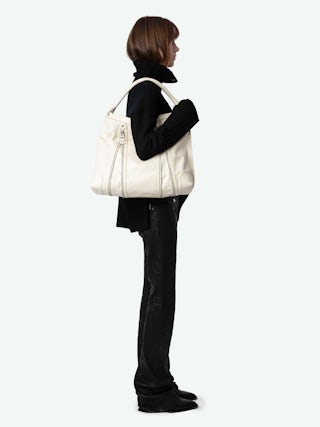 Sunny Hobo Bag - Vintage-effect patent leather hobo bag with handle and signature wings.