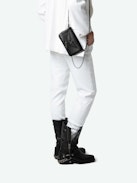 Rock Nano Clutch - Small grained leather clutch with double chain and embossed signature wings.