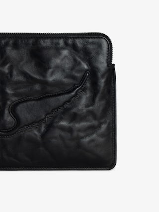 Angel Pochette - Grained leather clutch adorned with an embossed wing signature.