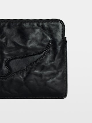 Angel Pochette - Grained leather clutch adorned with an embossed wing signature.