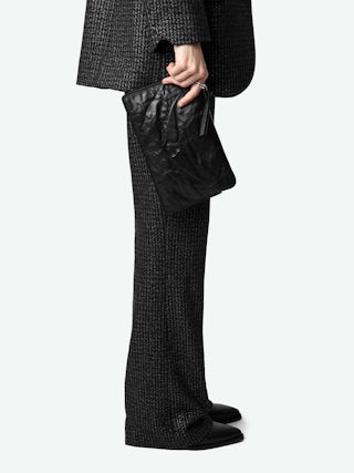 Angel Pochette - Grained leather clutch adorned with an embossed wing signature.