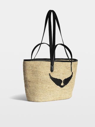 Sac Wings Panier - Panier en raphia avec anses en cuir, orné d'ailes.