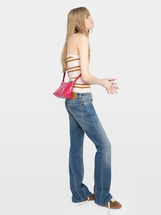 Sunny Mood Vintage Patent Tasche - Minitasche aus Lackleder mit Vintage-Effekt, mit verstellbarem Schulterriemen und Wings-Signatur.