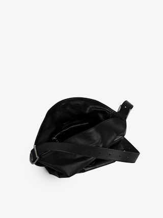 Baby Jane Bag - Leather bag with adjustable shoulder strap and debossed wing signature.